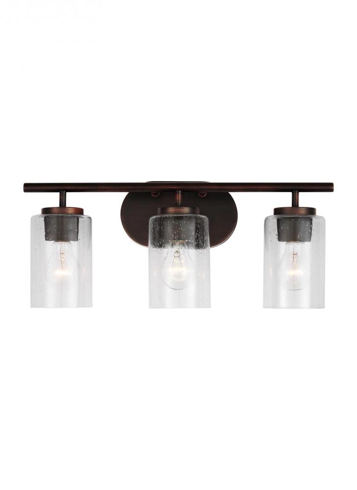 Oslo dimmable 3-light wall bath sconce in a bronze finish with clear seeded glass shade